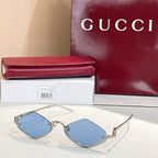 Gold-tone cat-eye sunglasses with blue lenses