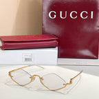 Gold-tone cat-eye sunglasses with clear lenses