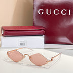 Gold-tone cat-eye sunglasses with light rose lenses