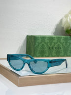 Glasses with blue frames and light tinted lenses