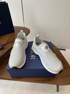 Unisex white slip-on sneakers with green logo and DIOR heel patch