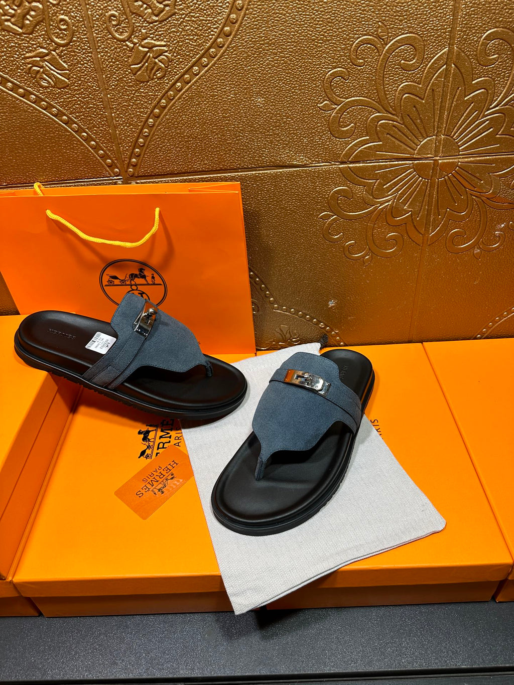 Hermes sandals set with blue suede straps and silver buckles on black slide soles