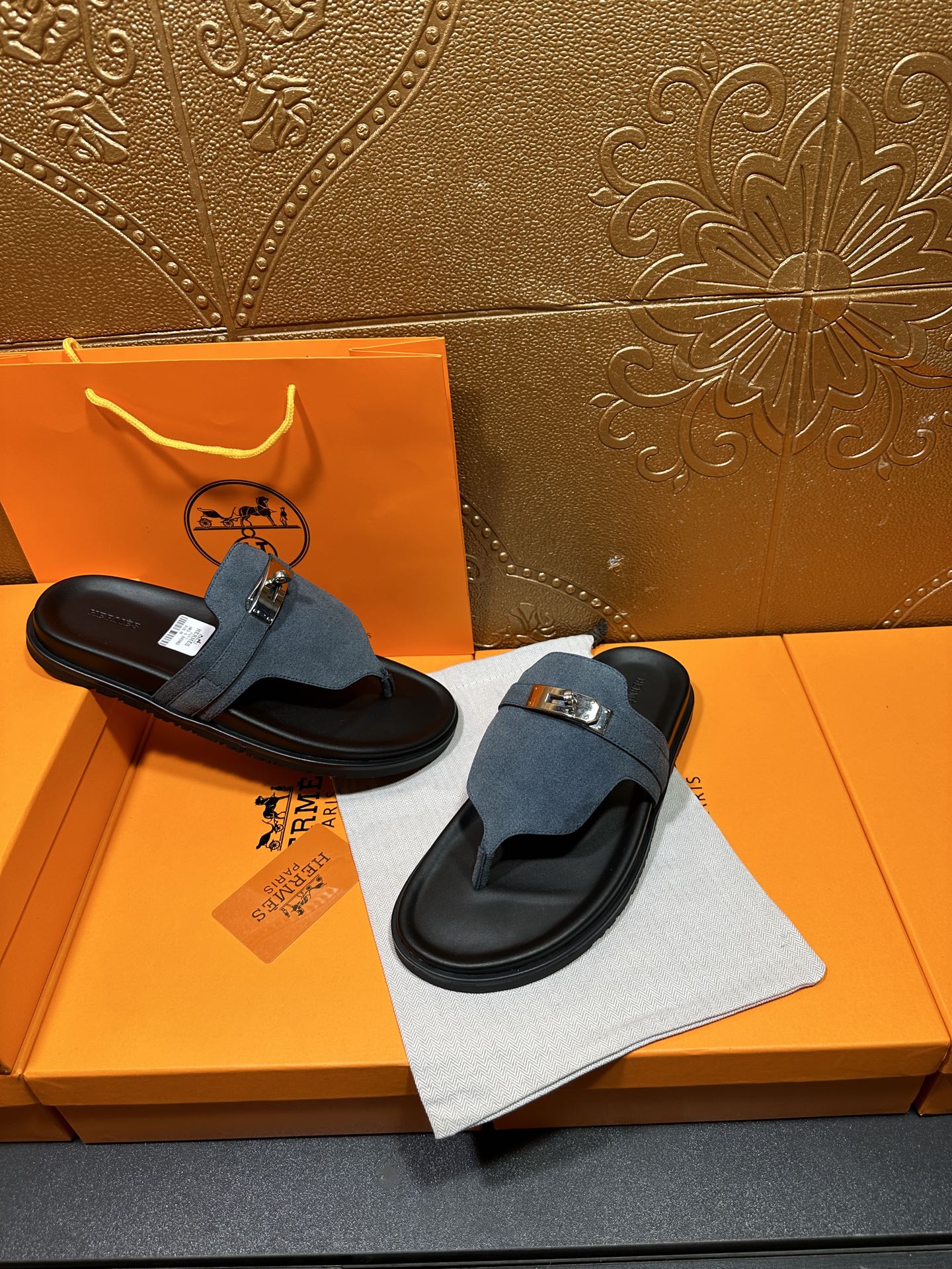 Hermes sandals set with blue suede straps and silver buckles on black slide soles
