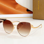 Bvlgari round sunglasses, gold frame with brown gradient lenses and jeweled temple detail