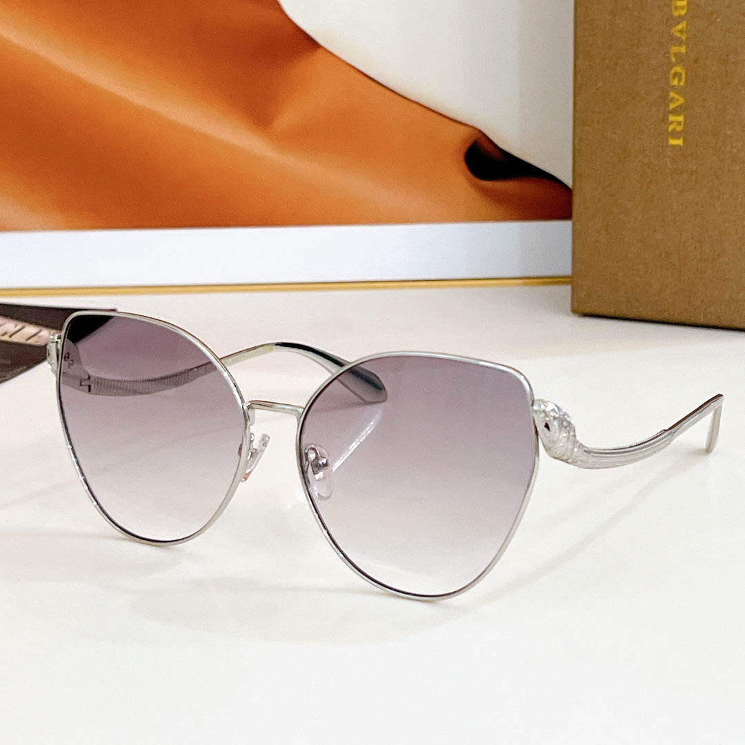 Bvlgari round sunglasses, silver frame with purple gradient lenses and jeweled temple detail