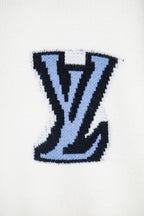 Blue LV monogram patch on white knit sweater