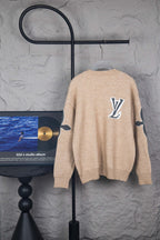 Beige knit sweater with large LV logo on back, crew neck, long sleeves