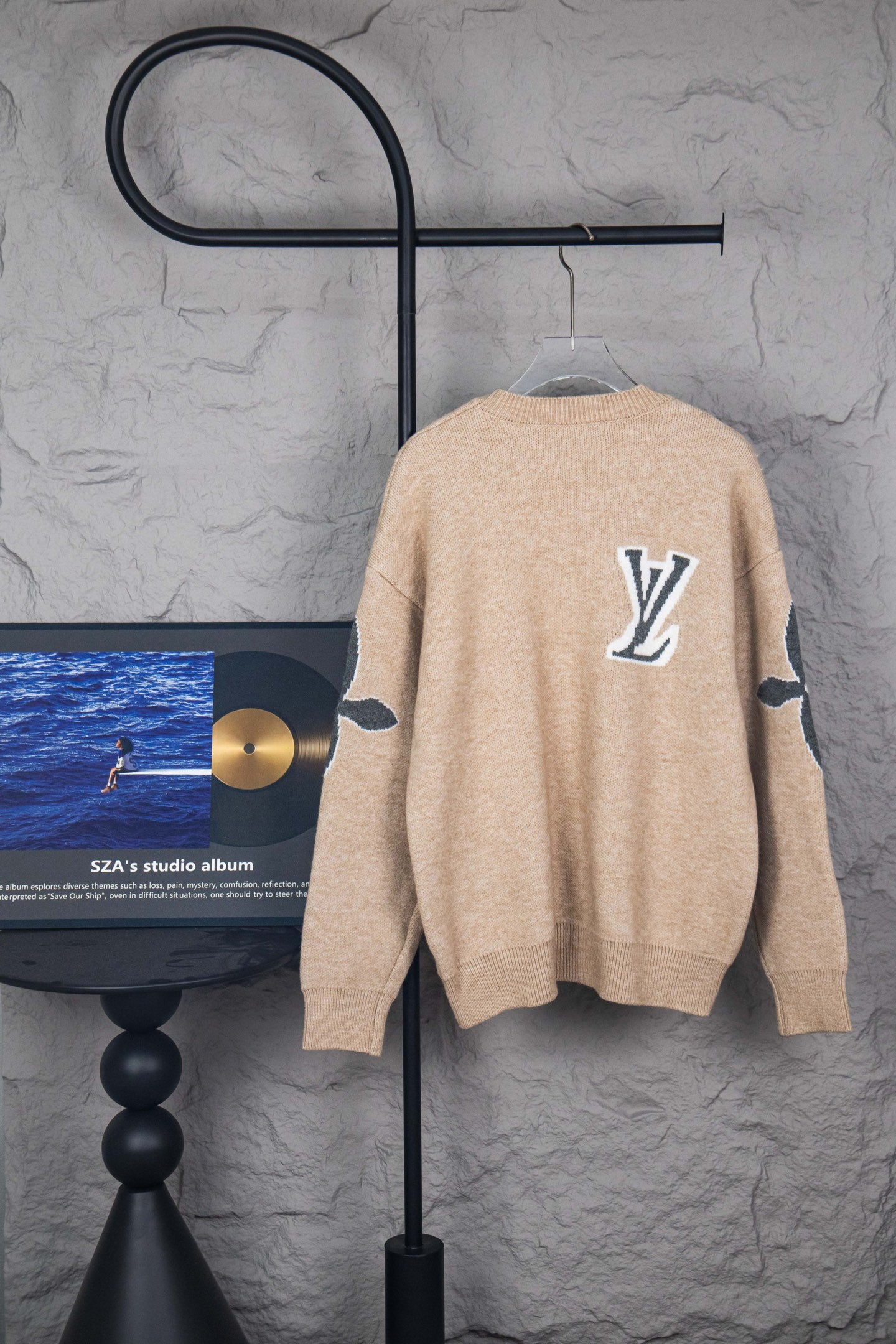 Beige knit sweater with large LV logo on back, crew neck, long sleeves