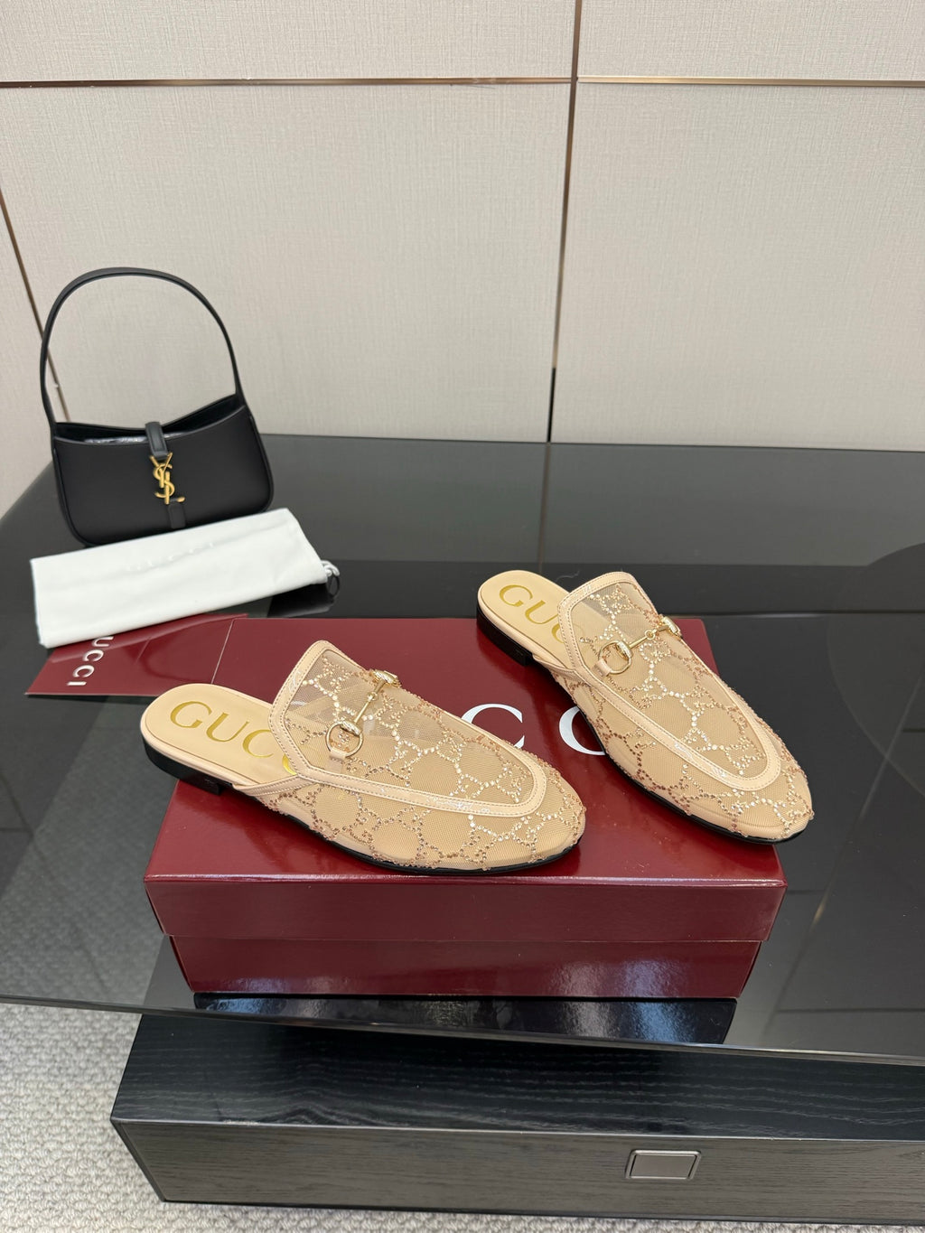 Gucci women's loafers, beige with GG pattern and gold horsebit, side view