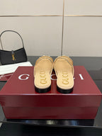 Gucci women's loafers, beige GG-print back view with branded footbeds