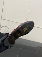 Gucci women's burgundy loafers outsole and insole view with gold logo