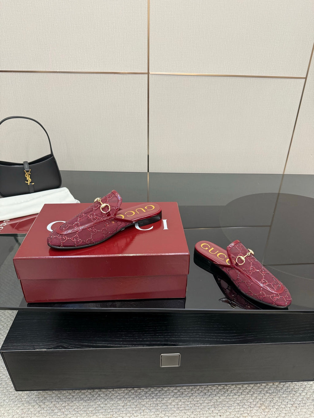 Gucci women's burgundy horsebit loafers, angled side view