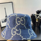 Gucci blue GG-pattern denim bucket cap, back view with stitched paneling