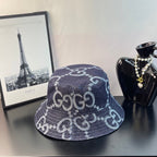 Gucci bucket hat in dark denim with white GG monogram logo pattern