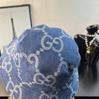 Gucci GG denim bucket hat in blue with repeating GG monogram print, rear view