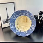 Gucci GG denim bucket hat shown from inside, blue monogram fabric