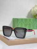 Black square sunglasses with gray lenses and red/green temple stripe.