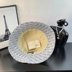 Dior bucket hat showing interior lining in light beige and all-over monogram pattern