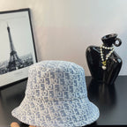 Dior bucket hat in light blue with white monogram pattern, front view