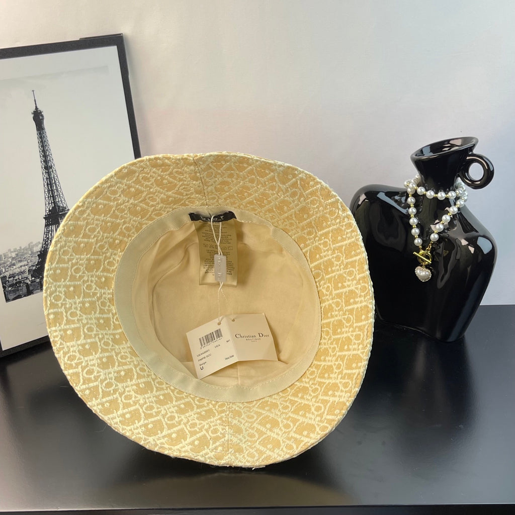 Bucket cap interior and brim lining, yellow monogram fabric