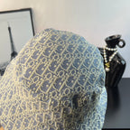 Gucci bucket hat fabric in light blue with gold monogram weave pattern