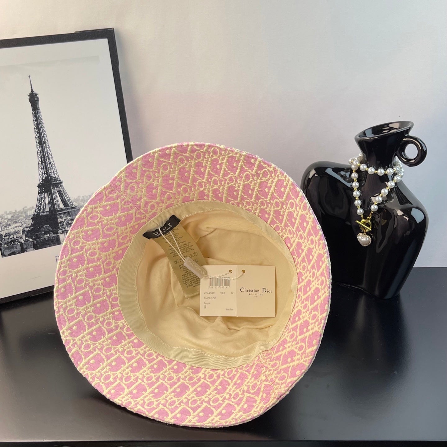 Pink Dior monogram bucket hat interior with cream lining and size label