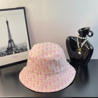 Gucci pink monogram bucket cap with wide brim and stitched pattern