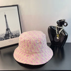 Gucci pink monogram bucket cap, front view with wide brim