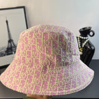 Pink Dior monogram bucket hat, close-up of patterned crown and wide brim