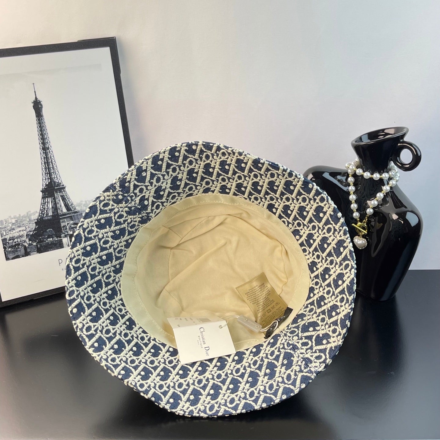 Dior monogram bucket hat in blue with gold pattern, interior view
