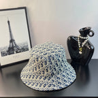 Dior monogram bucket hat in blue with allover gold design