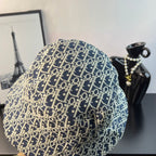 Dior monogram bucket hat in blue with gold allover geometric print