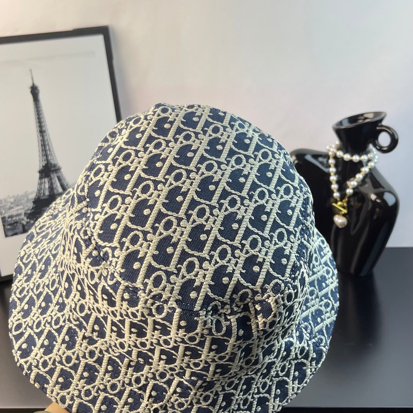 Gucci monogram bucket cap, close side view in blue with gold print