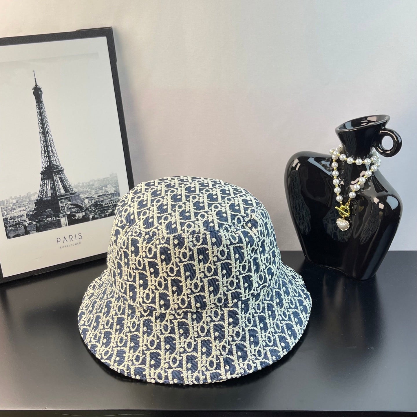 Dior monogram bucket hat in blue with gold pattern and wide brim