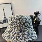 Dior monogram bucket hat in blue with gold pattern and curved brim