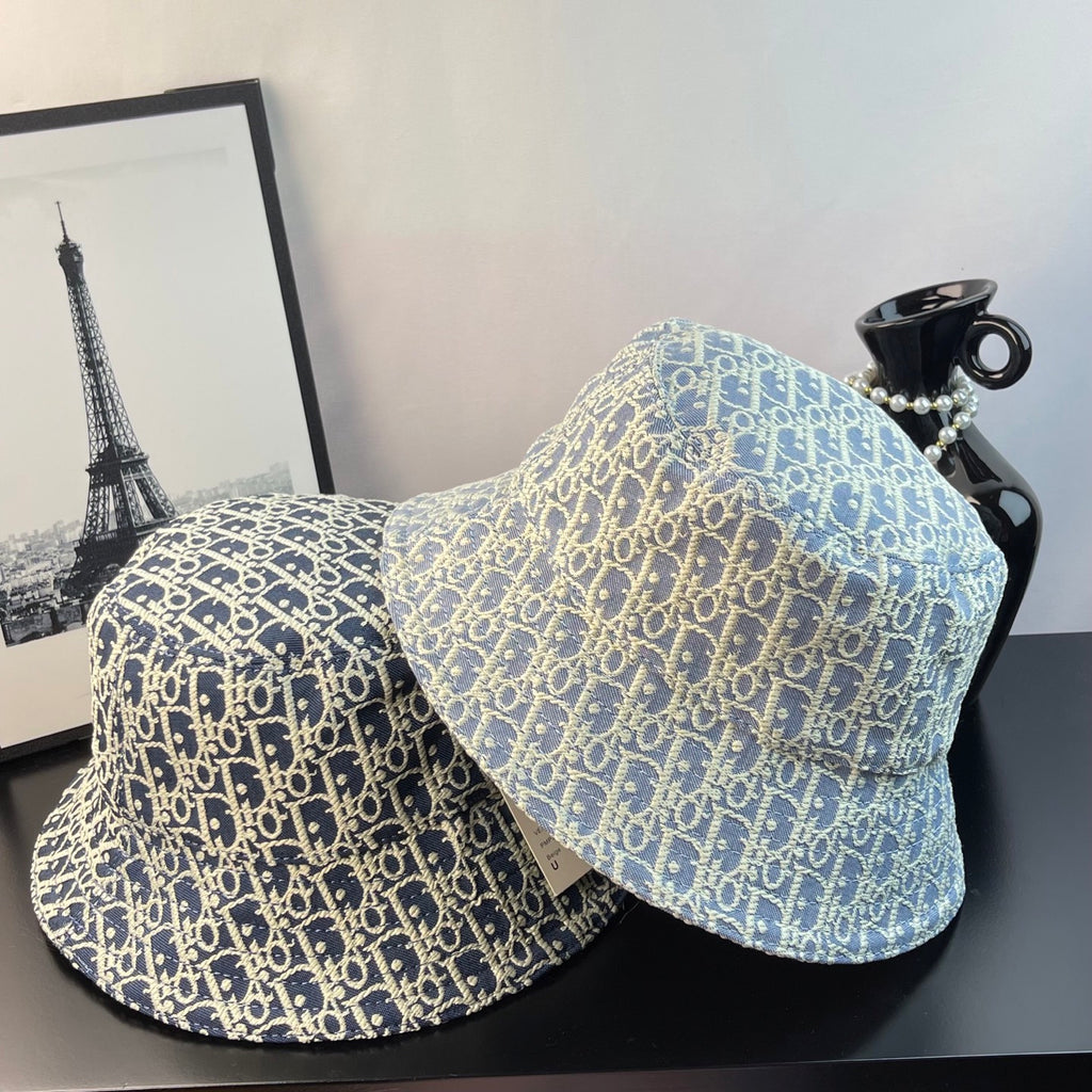 Dior monogram bucket hat in blue with gold pattern, two angles shown