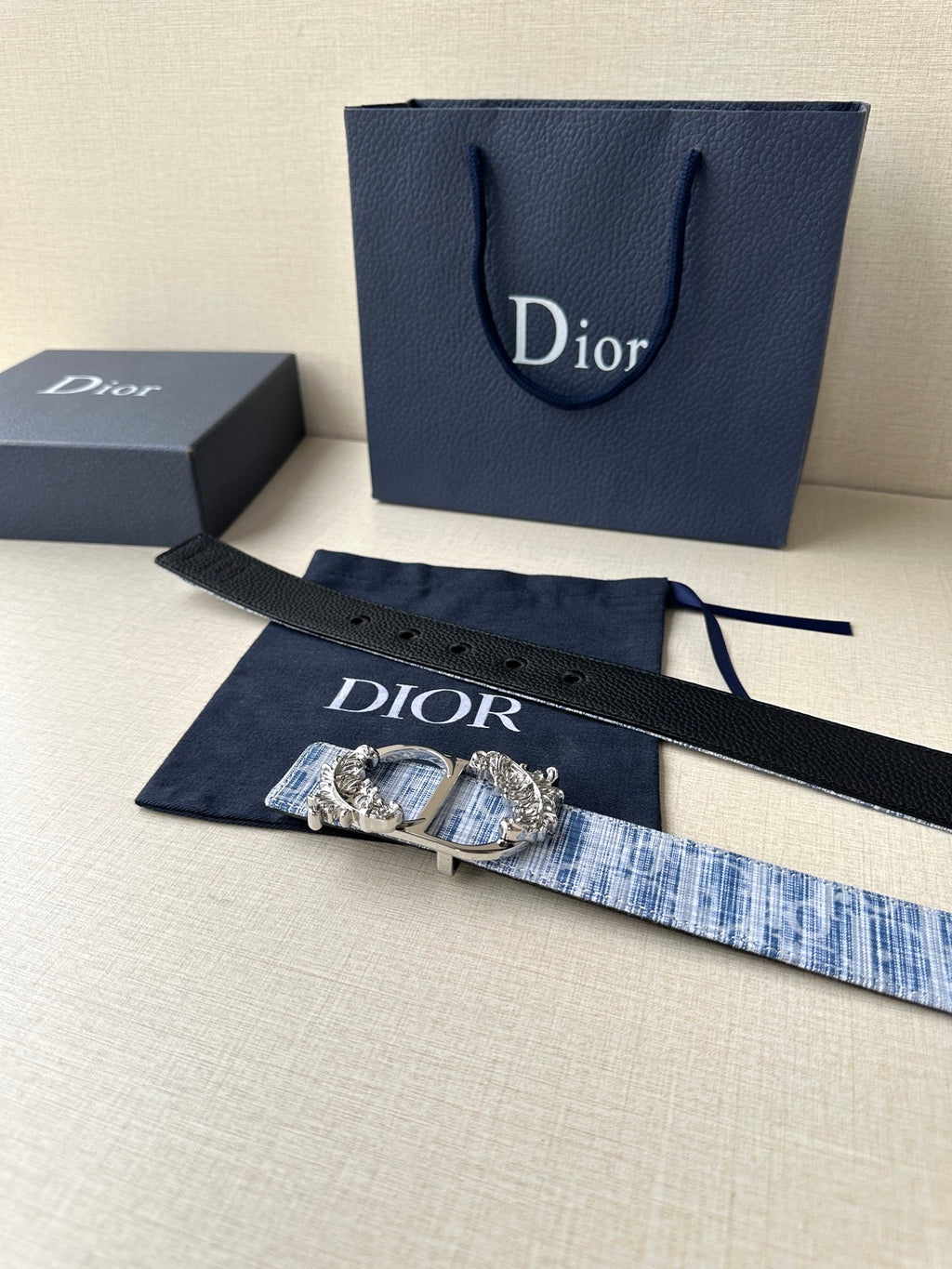Dior belt with blue woven strap and gold buckle, with Dior logo dust pouch