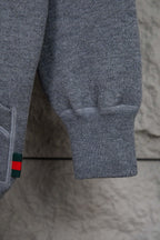 Heather gray hoodie pant-style hem with ribbed cuff and small multicolor trim