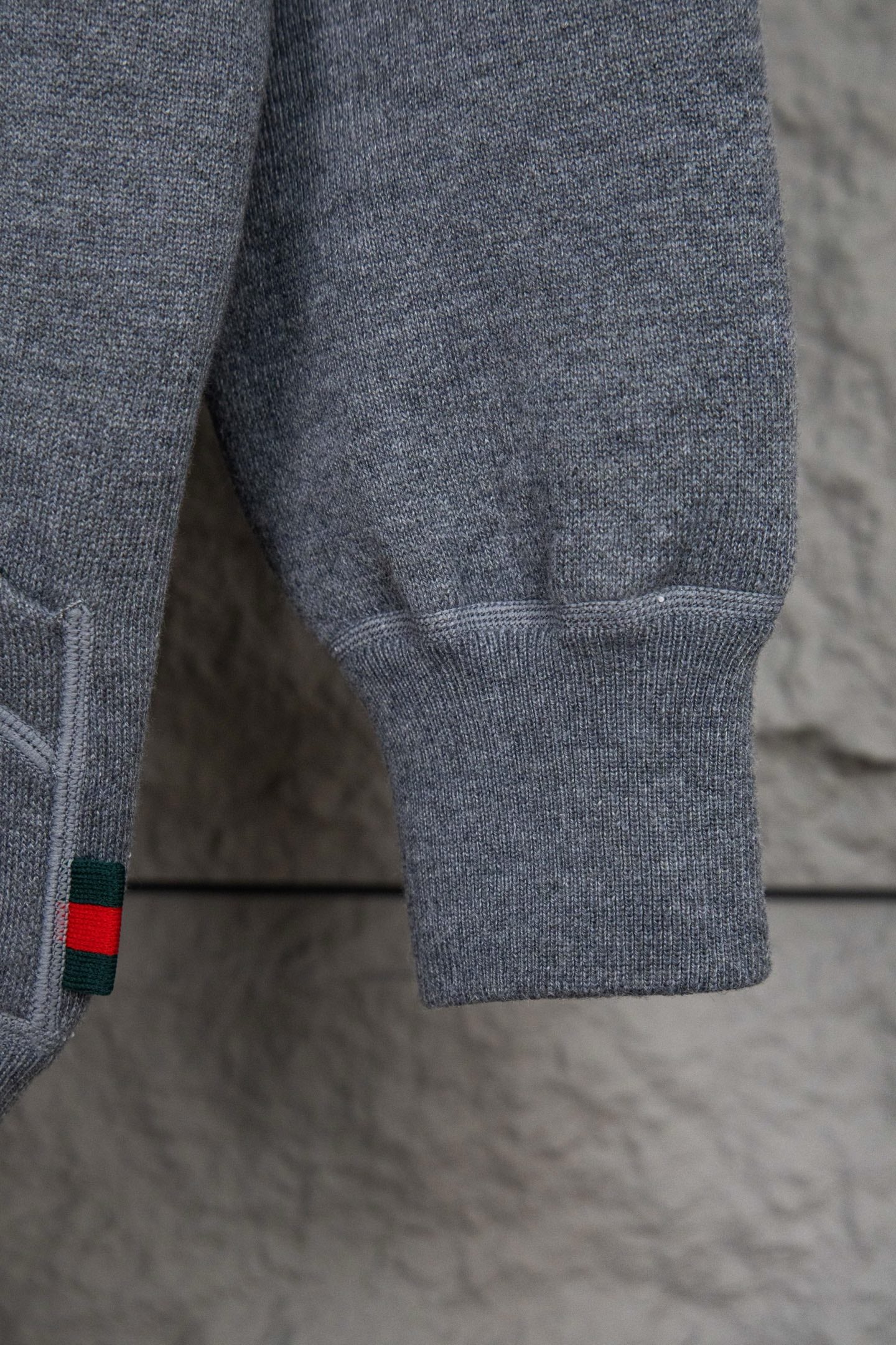 Heather gray hoodie pant-style hem with ribbed cuff and small multicolor trim