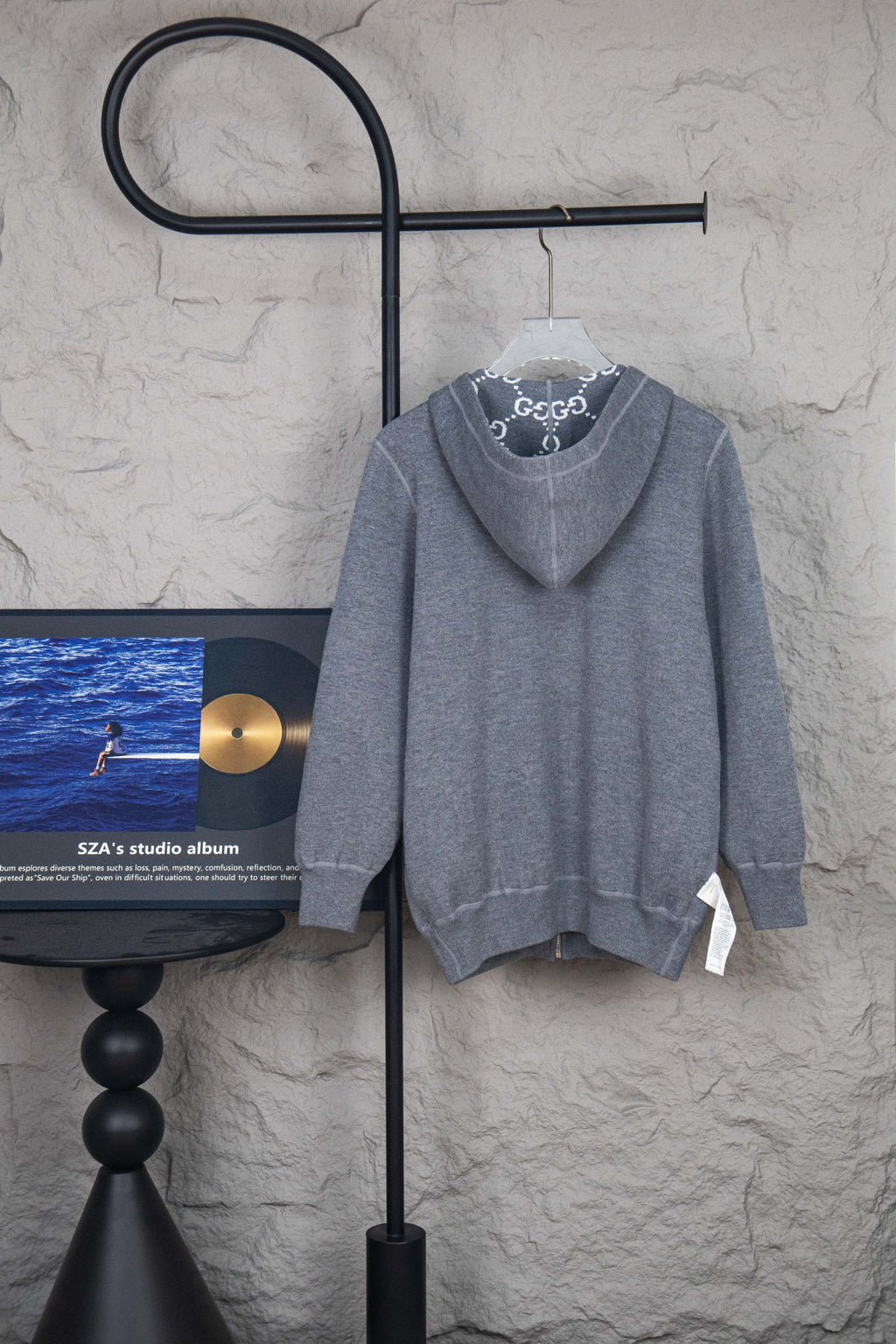Heather gray zip-up hoodie with hood, kangaroo pocket, and full zipper
