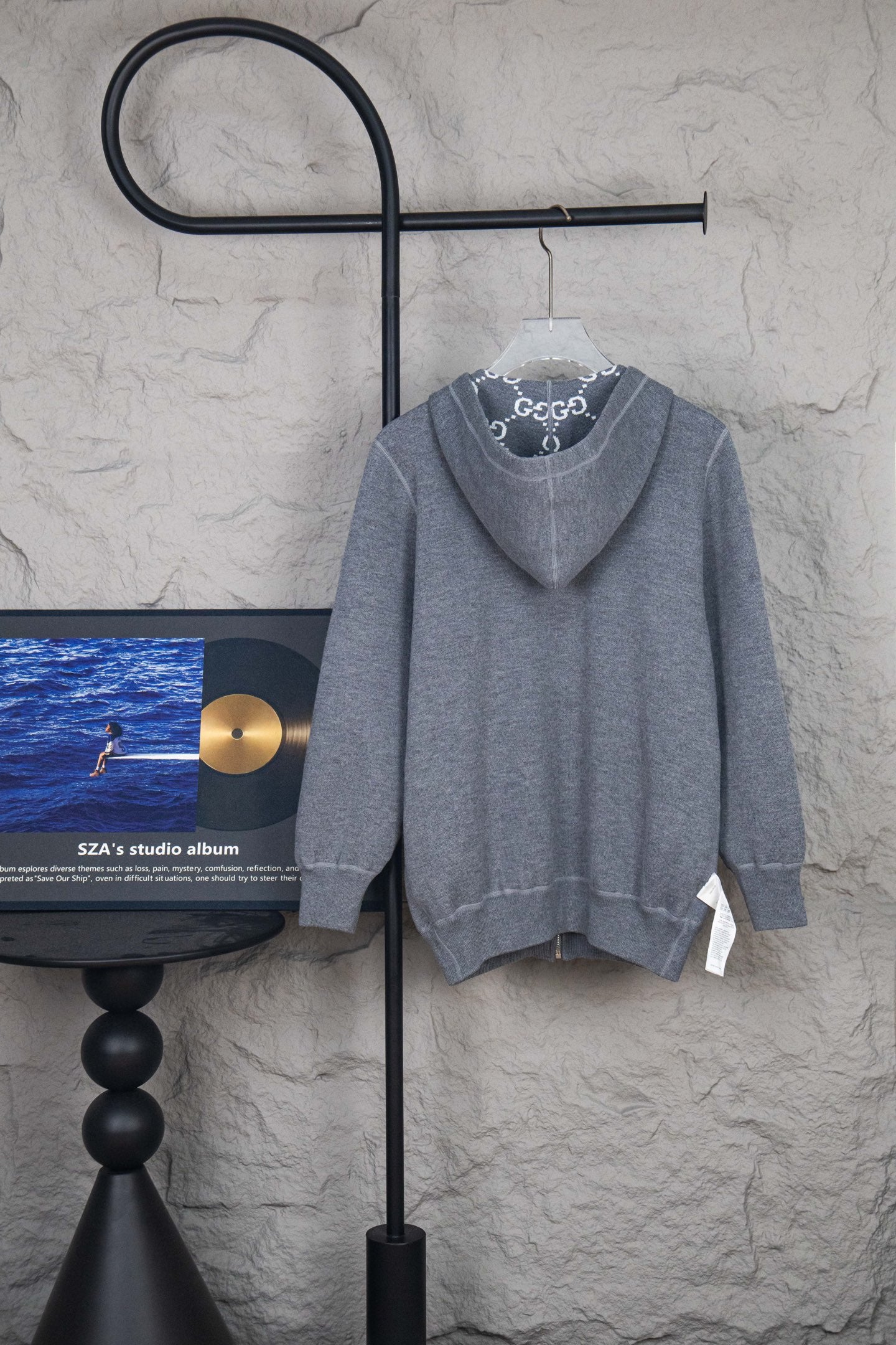Heather gray zip-up hoodie with hood, kangaroo pocket, and full zipper