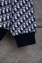 Dior monogram knit long-sleeve top with ribbed cuff hem