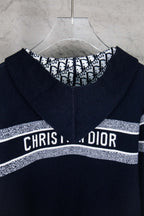 Dior logo zip-up top, black long sleeves with white striped band and front zipper
