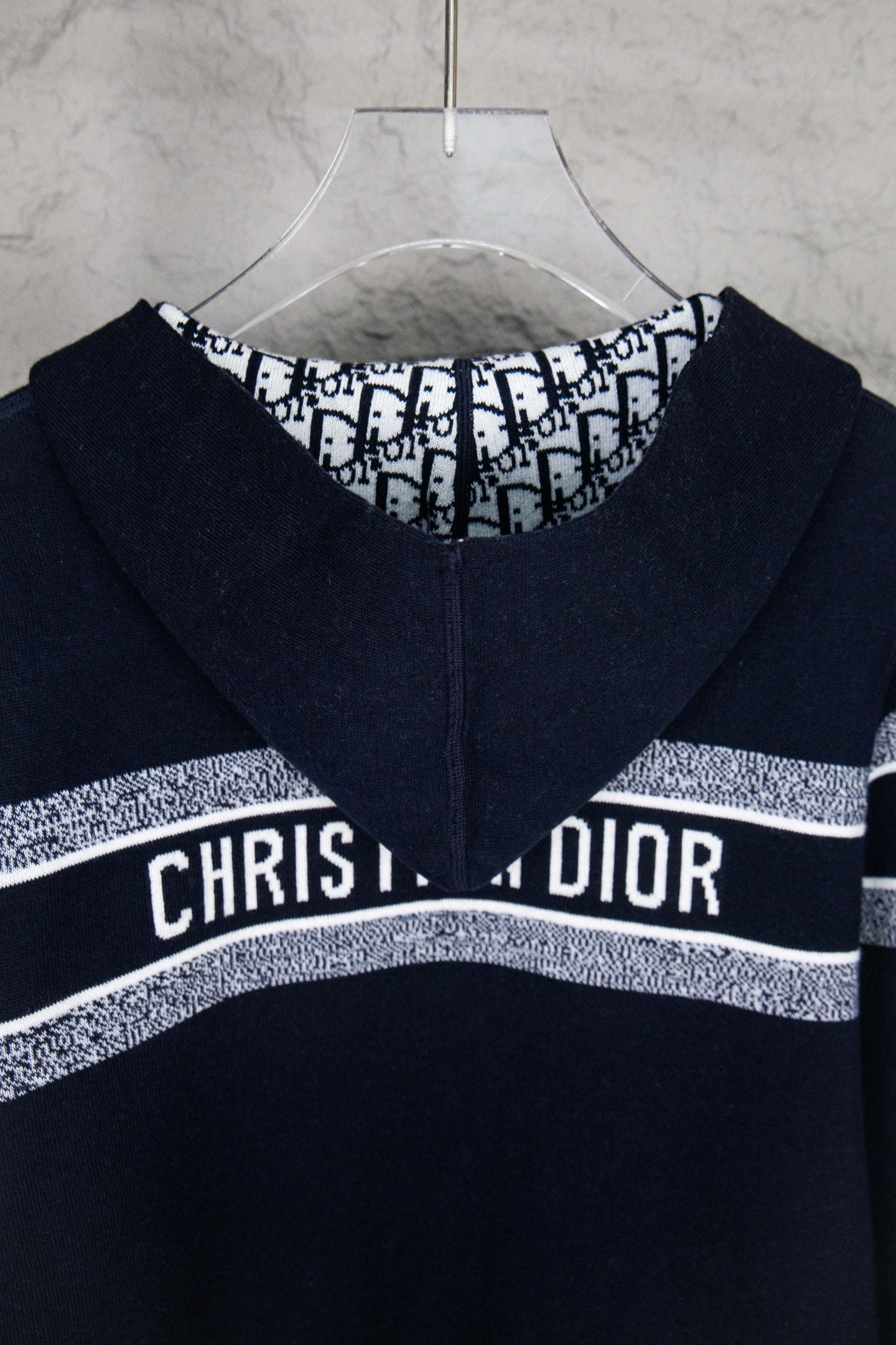 Dior logo zip-up top, black long sleeves with white striped band and front zipper