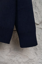 Navy ribbed knit cardigan hem and sleeve cuff