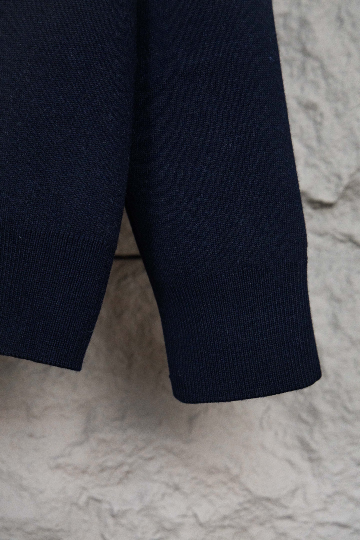 Navy ribbed knit cardigan hem and sleeve cuff