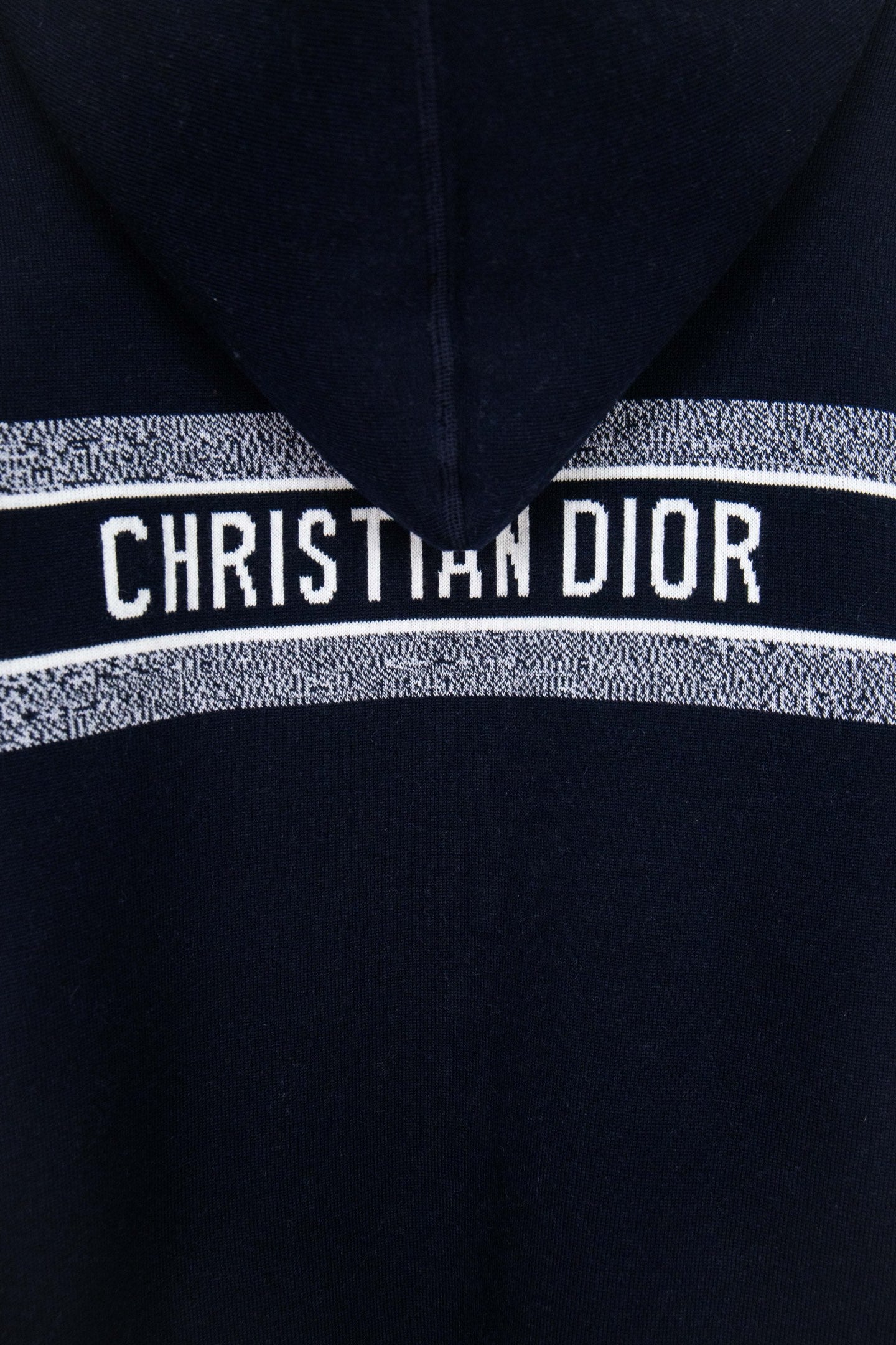 Navy hood stripe with "CHRISTIAN DIOR" text