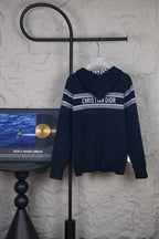 Navy zip-up cardigan with striped band and Christian Dior logo