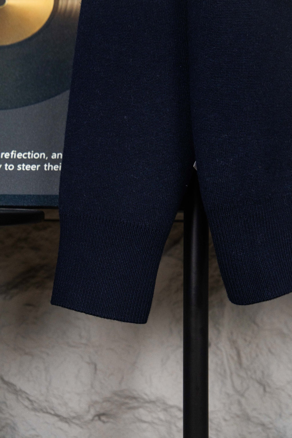 Navy knit cardigan with ribbed hem and sleeve cuff detail