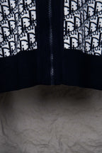 Dior knit jacket front view with centered zipper seam and monogram pattern